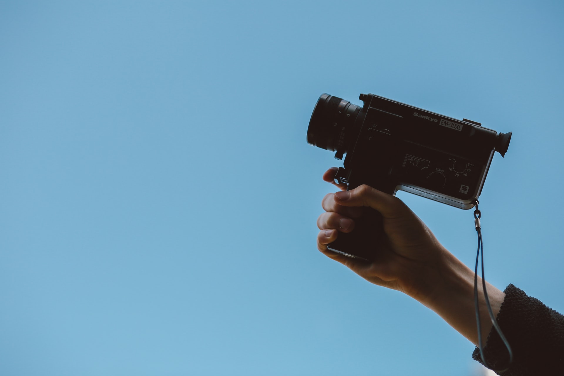 a person holding a camera