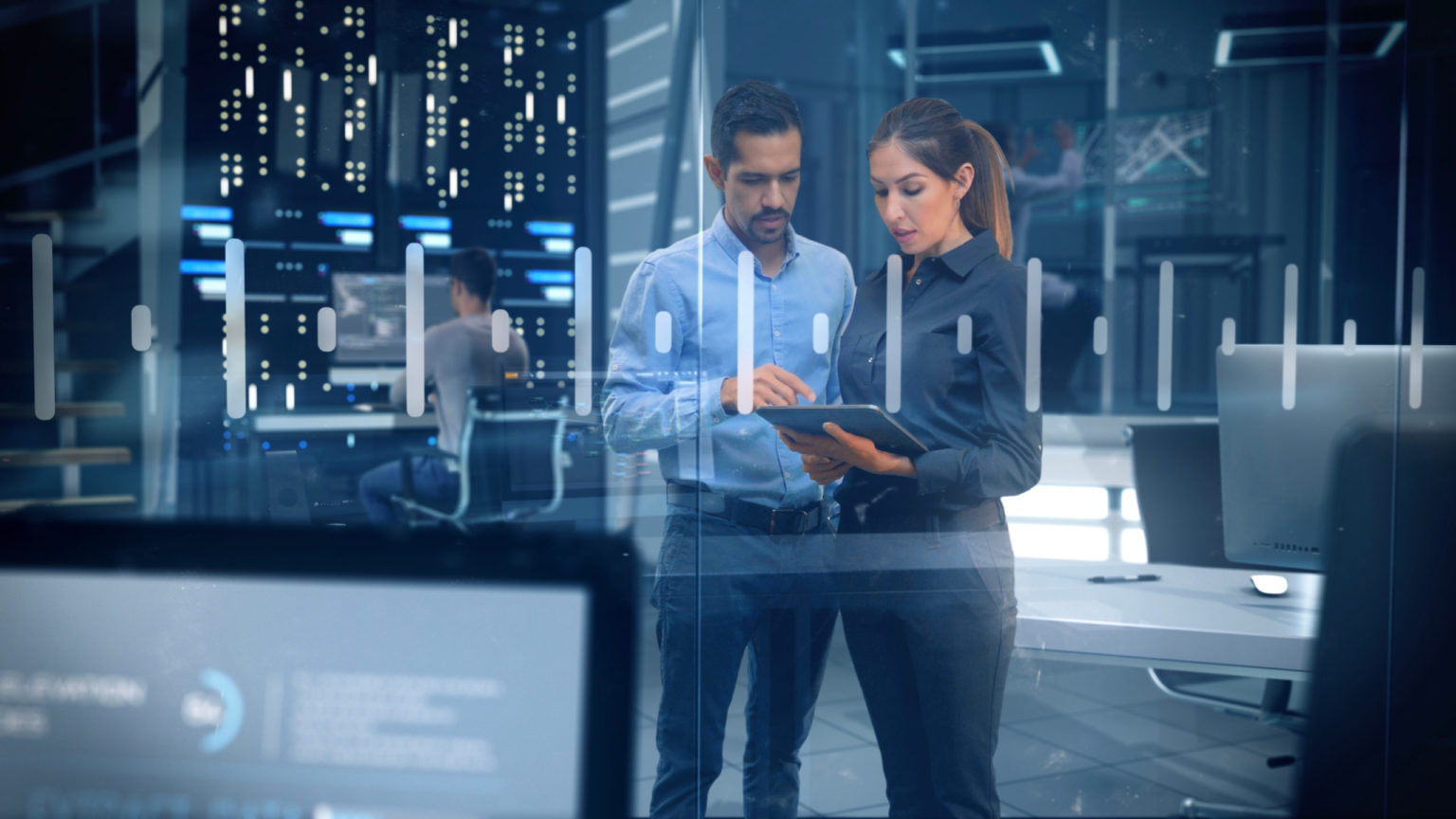 a man and a woman in a server room